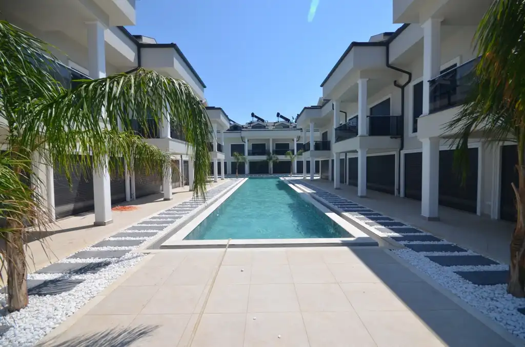 Изображение Новая квартира 4+1 в уникальном комплексе в Фетхие в 10 минутах от пляжа